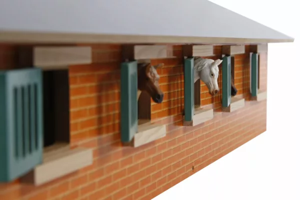 Wooden toy stable block