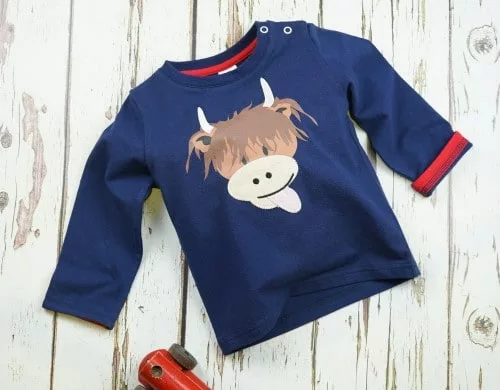 Navy long sleeved top with Highland cow, Blade & Rose